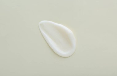 Işık arka planında vücut kremi örneği, üst görünüm