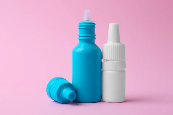 Бутылки Медицинских Капель Розовом Фоне — стоковое фото
