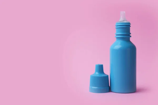Fles Medische Druppels Roze Achtergrond Ruimte Voor Tekst — Stockfoto