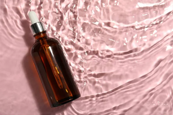 Fles Hydrofiele Olie Water Roze Achtergrond Bovenaanzicht Ruimte Voor Tekst — Stockfoto