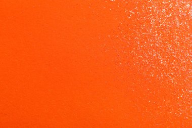 Turuncu arka planda parlak parlak parıltı, düz yatış. Metin için boşluk