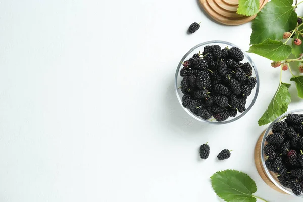 Delicious Ripe Black Mulberries Green Leaves White Table Flat Lay — Stock Photo, Image