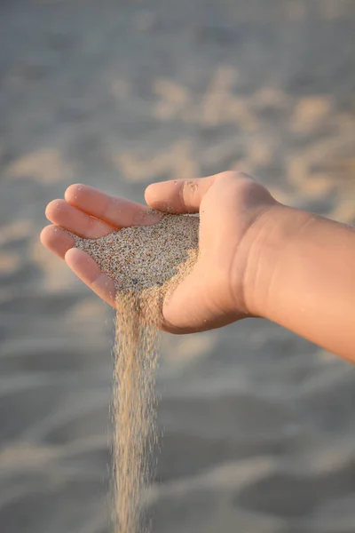 Girl Pouring Sand Hand Outdoors Closeup Fleeting Time Concept Stock Image
