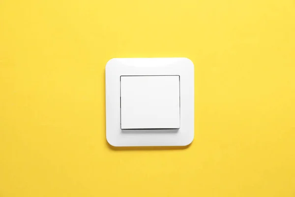 Modern Plastic Light Switch Orange Background — Stock Photo, Image