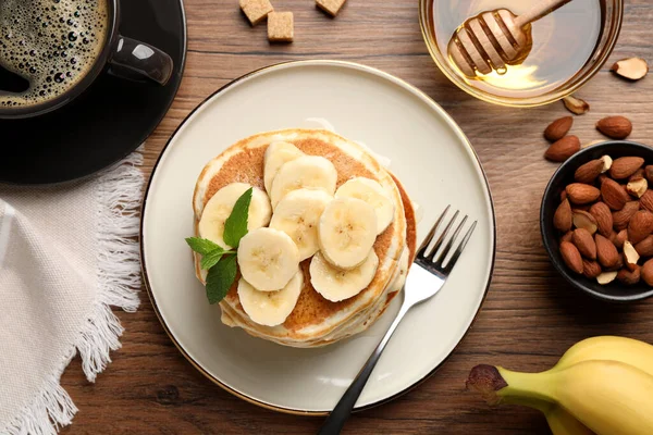 Tasty Pancakes Sliced Banana Served Wooden Table Flat Lay — Stok Foto