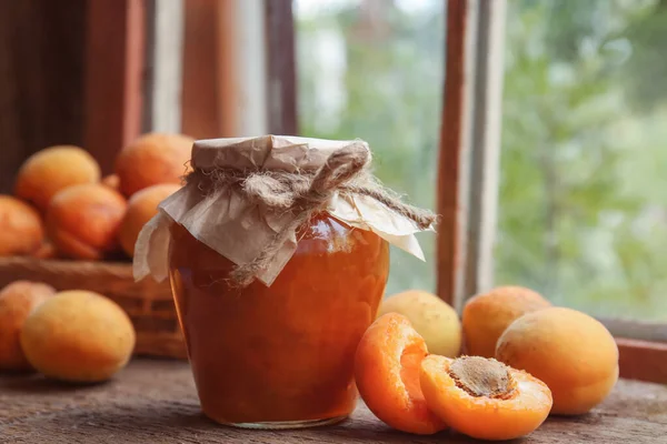 Jar Delicious Jam Fresh Ripe Apricots Wooden Table Indoors Fruit — Stock Fotó