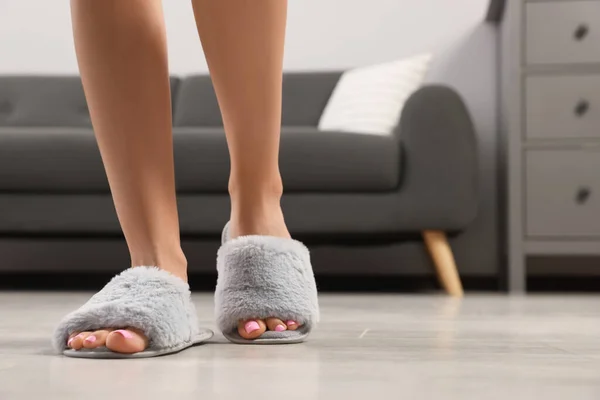 Woman Wearing Grey Soft Slippers Home Closeup — стоковое фото