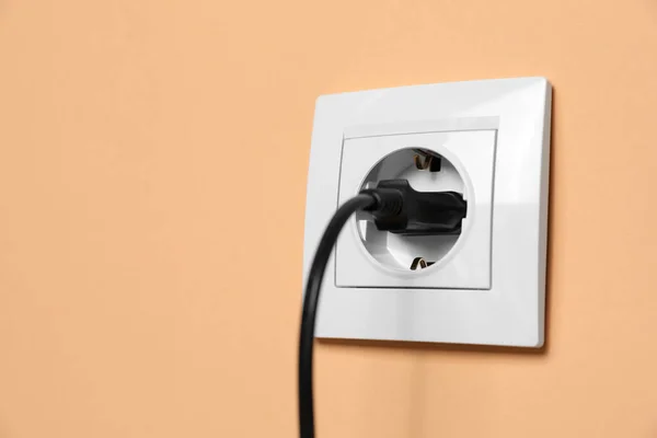 Power Socket Inserted Plug Pale Orange Wall Space Text Electrical — Fotografia de Stock