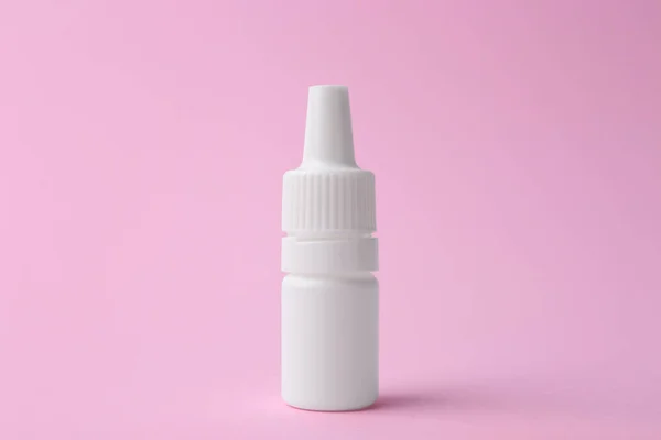 Fles Van Medische Druppels Roze Achtergrond — Stockfoto