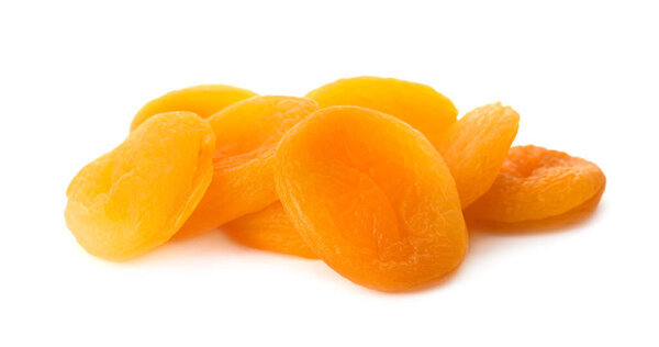 Pile of tasty apricots on white background. Dried fruits