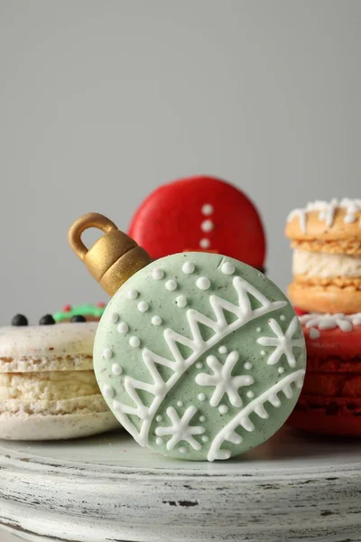 Beautifully Decorated Christmas Macarons Stand Light Grey Background Closeup — Stock fotografie