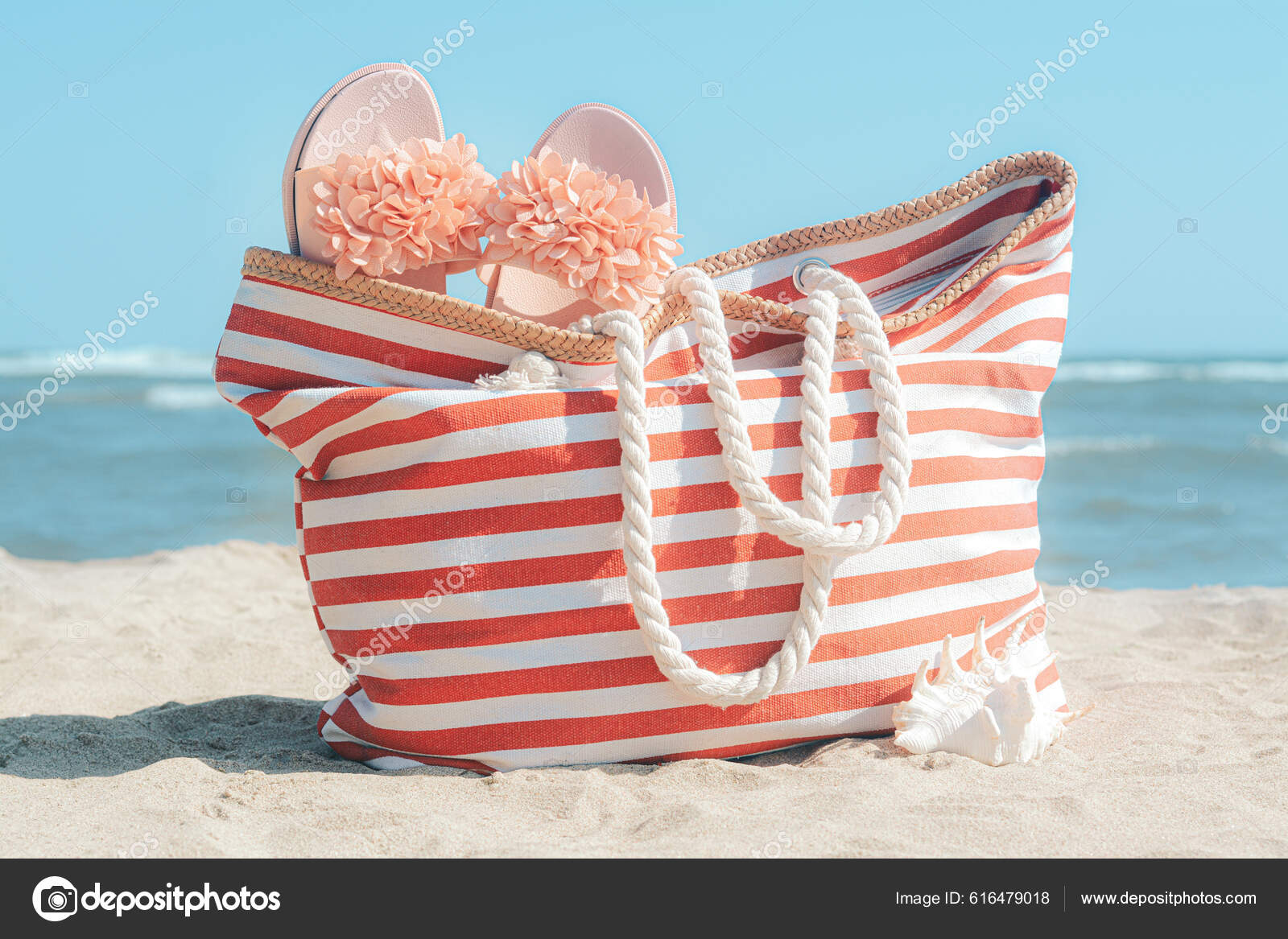 Stylish Striped Bag Slippers Seashell Sandy Beach Sea Stock Photo by  ©NewAfrica 616479018
