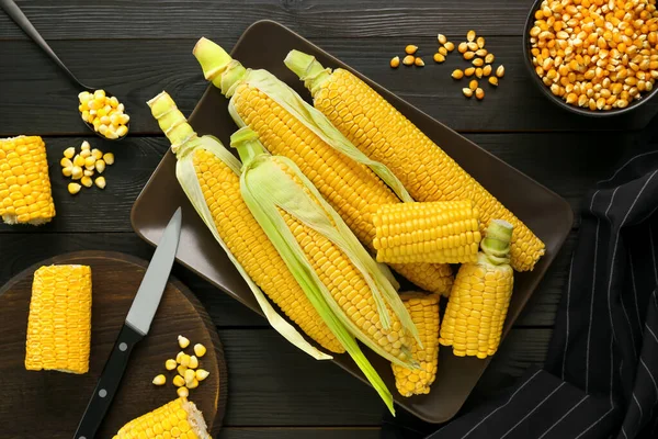 Tasty Fresh Corn Cobs Kernels Black Wooden Table Flat Lay — Stock Photo, Image