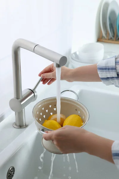 Woman Washing Fresh Ripe Lemons Tap Water Kitchen Closeup — Foto de Stock
