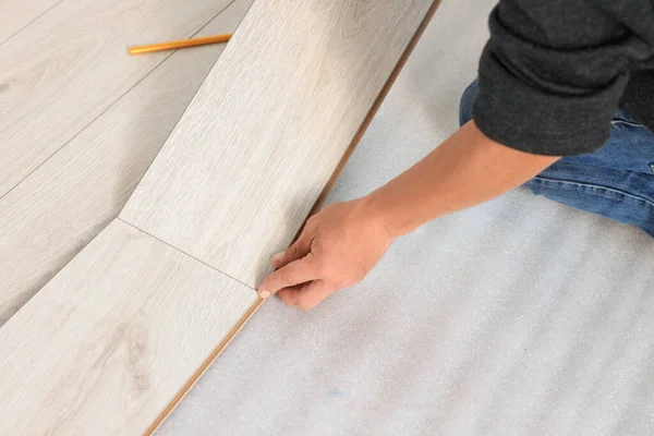 Professional Worker Installing New Laminate Flooring Closeup — Stock Photo, Image