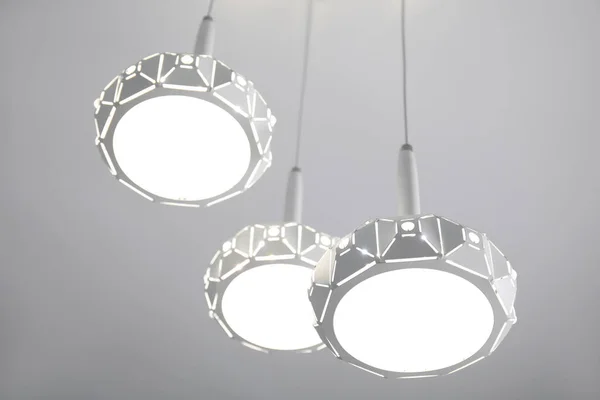 Stylish Pendant Lamp White Ceiling Low Angle View — Foto de Stock