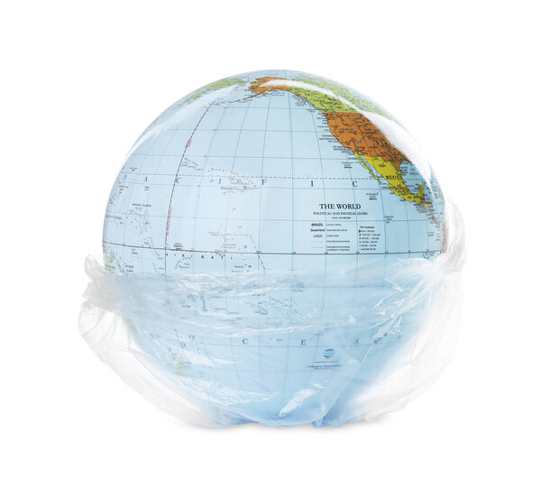 Globe in plastic bag isolated on white. Environmental conservation