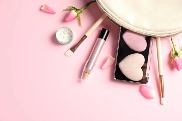 Set Makeup Products Bag Roses Light Pink Background Flat Lay — Zdjęcie stockowe