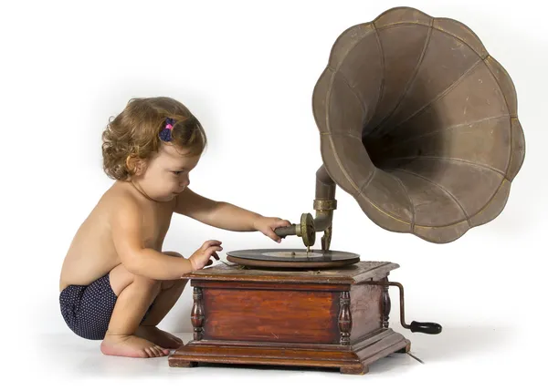 Младенец и граммофон — стоковое фото