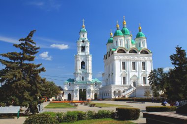 View of the Cathedral bell-tower with Prechistenskaya the gate and the assumption Cathedral in Astrakhan clipart