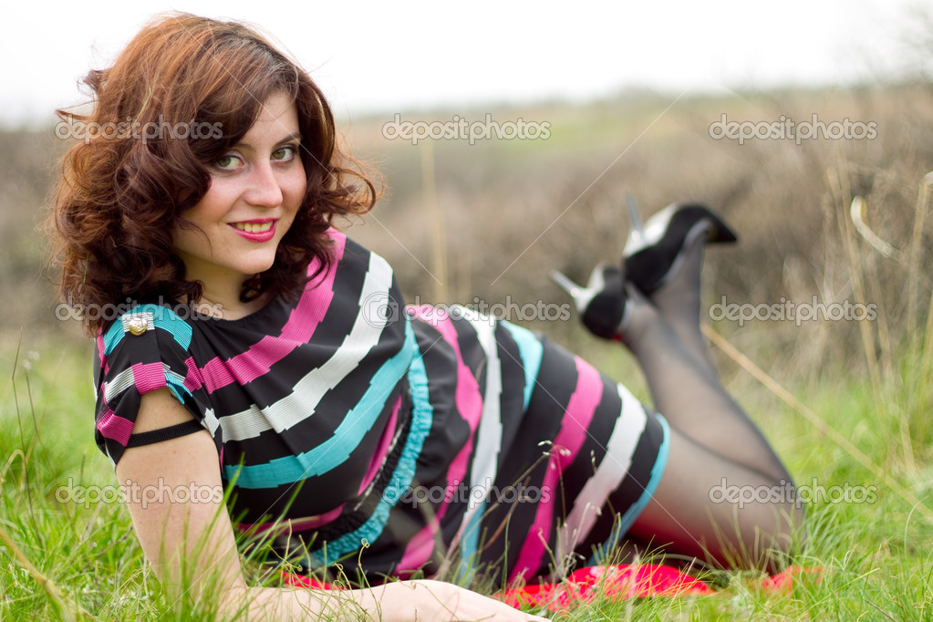 A young girl in a spring wood