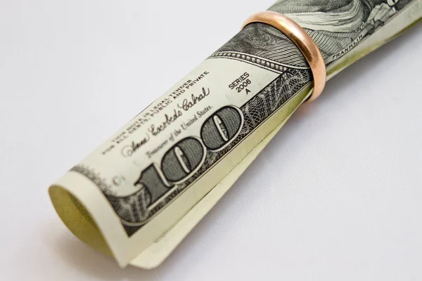 Dollar in wedding ring — Stock Photo, Image
