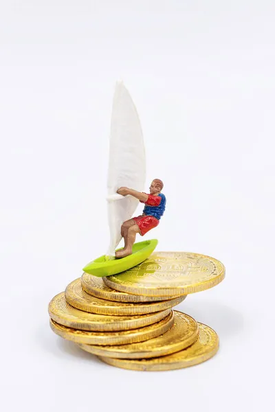 Toy Wind Surfer Rides Bitcoin Gold Coins Waves — Stock Photo, Image