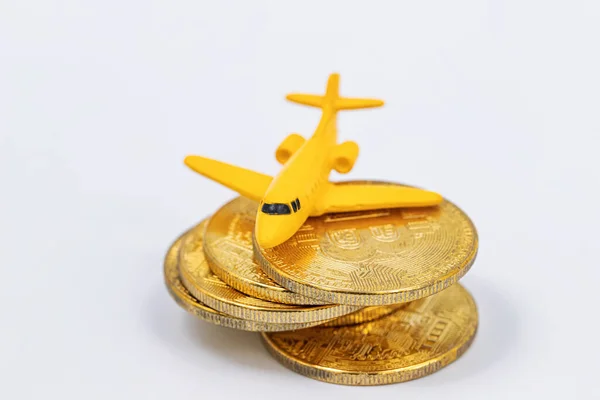 Toy Model Plane Lies Top Gold Coins Bitcoin — Stock Photo, Image