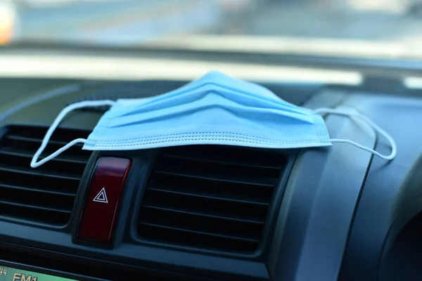 Protective face mask in car