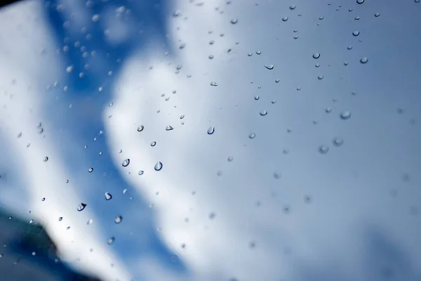 water droplets on glass sky background