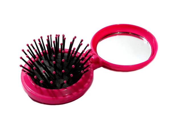 Cepillo rosa y espejo —  Fotos de Stock