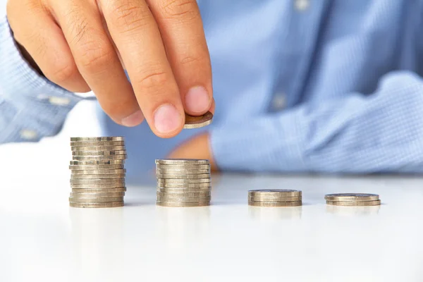 Hand put coin to stack — Stock Photo, Image