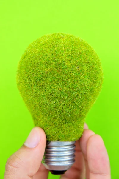 Hand met eco lamp energieconcept — Stockfoto