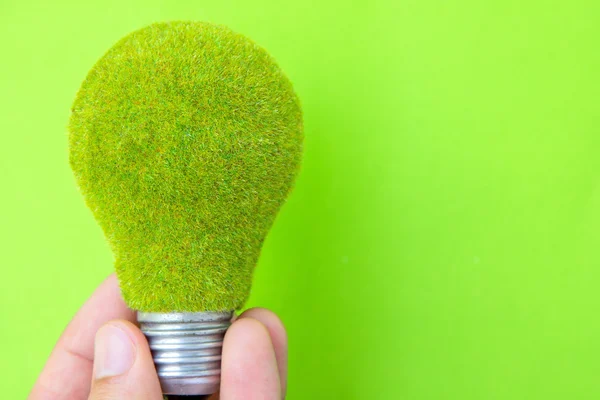 Hand met eco lamp energieconcept — Stockfoto