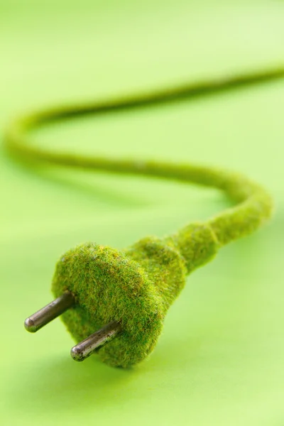 Abstract image of green electric plug — Stock Photo, Image
