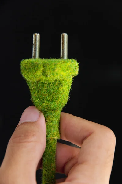 抽象形象的绿色电插头 — 图库照片