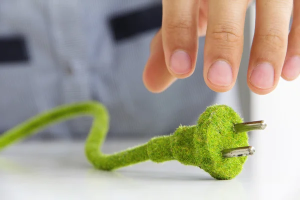 Green electric plug — Stock Photo, Image