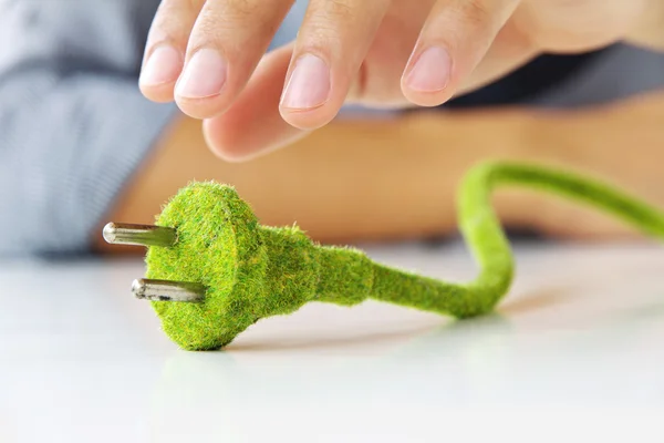 Green electric plug — Stock Photo, Image