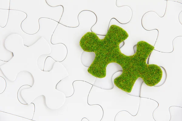 Peça de puzzle verde — Fotografia de Stock