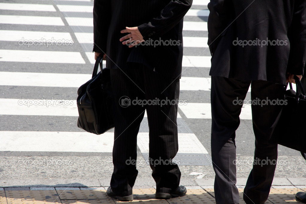 Businessmen going to his office