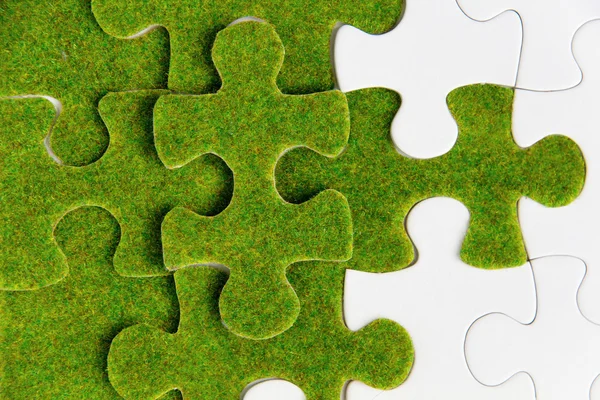Pezzo puzzle verde — Foto Stock