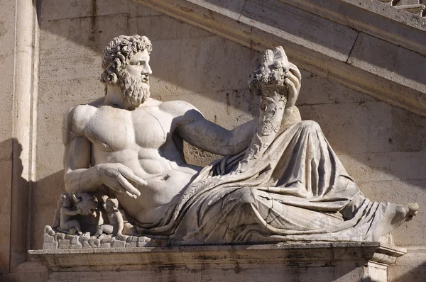 Statue with horn of plenty in Piazza del Campidoglio, in Rome — Stock Photo, Image