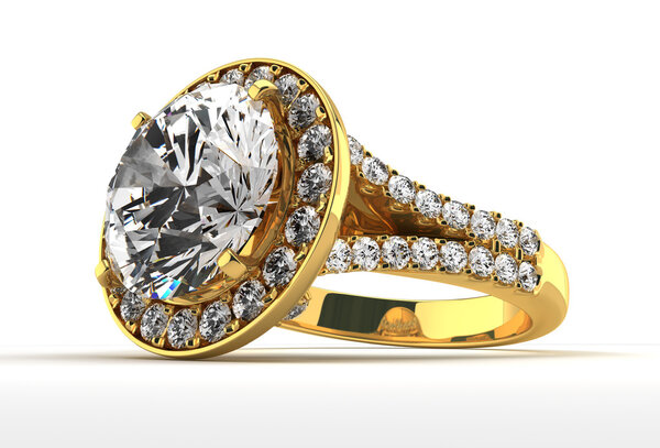 бриллиантовое кольцо на белом
