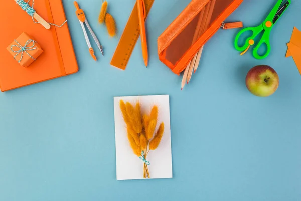 Back to school concept bouquet of orange flowers teachers day — Stock Photo, Image