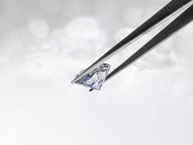 Beyaz parlak bokeh arka planında cımbızla parlayan elmas. En iyi elmas mücevher tasarımı konsepti