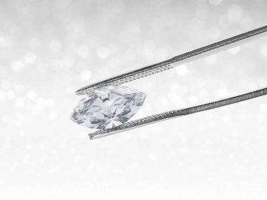 Beyaz parlak bokeh arka planında cımbızlı elmas. En iyi elmas mücevher tasarımı konsepti