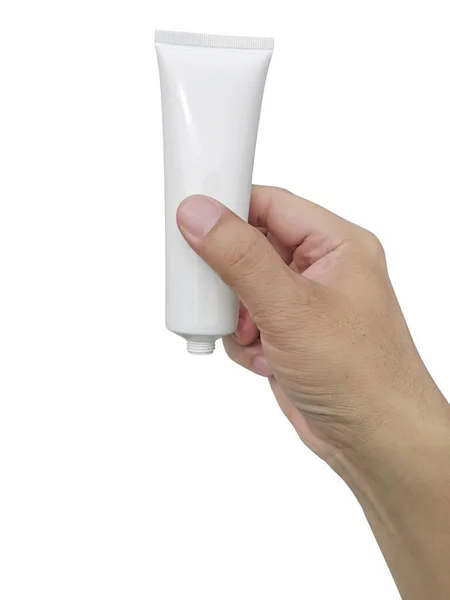 白い背景に隔離された手保持化粧品プラスチックチューブ — ストック写真