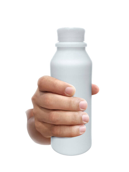 hand holding milk bottle isolated on white background