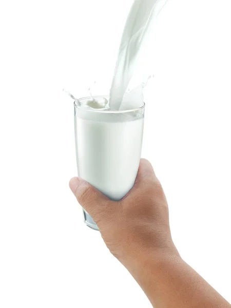 白底上有一杯牛奶的手 — 图库照片
