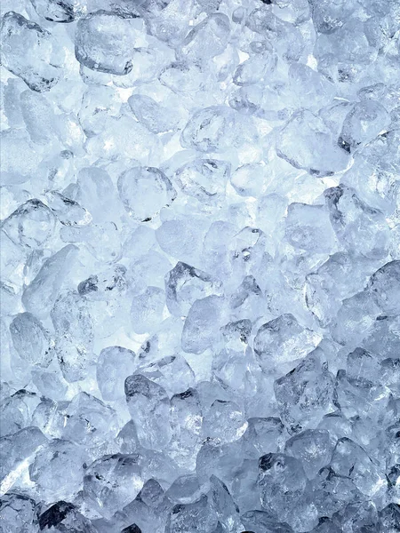 clear ice cubes as background, top view